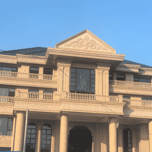 威海黄金麻别墅外墙干挂石材效果示例